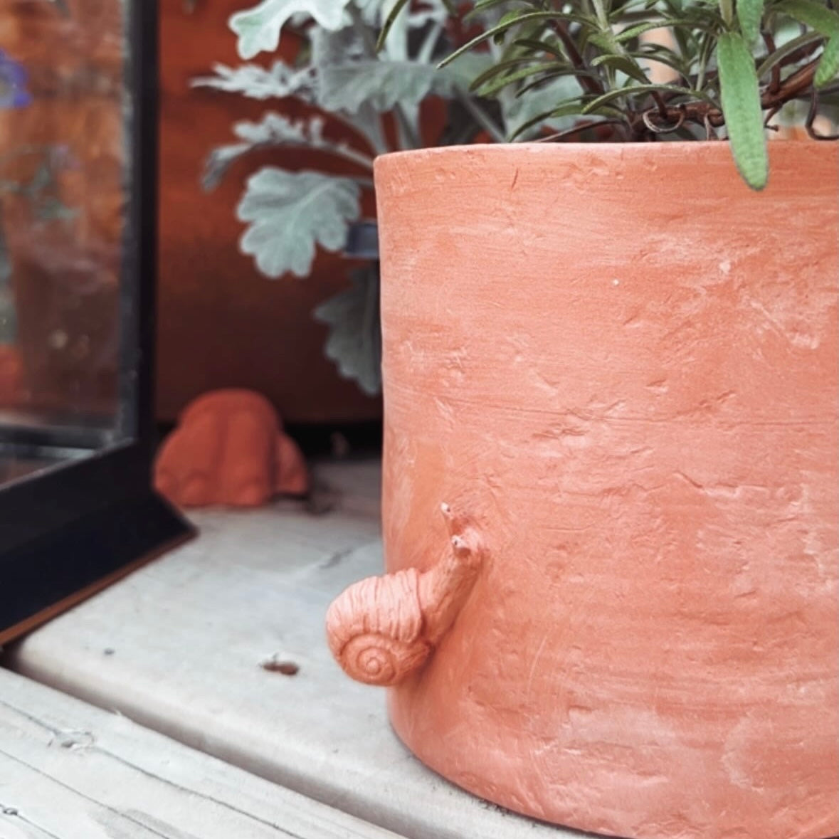 HANDMADE AGED TERRACOTTA POT WITH SNAIL