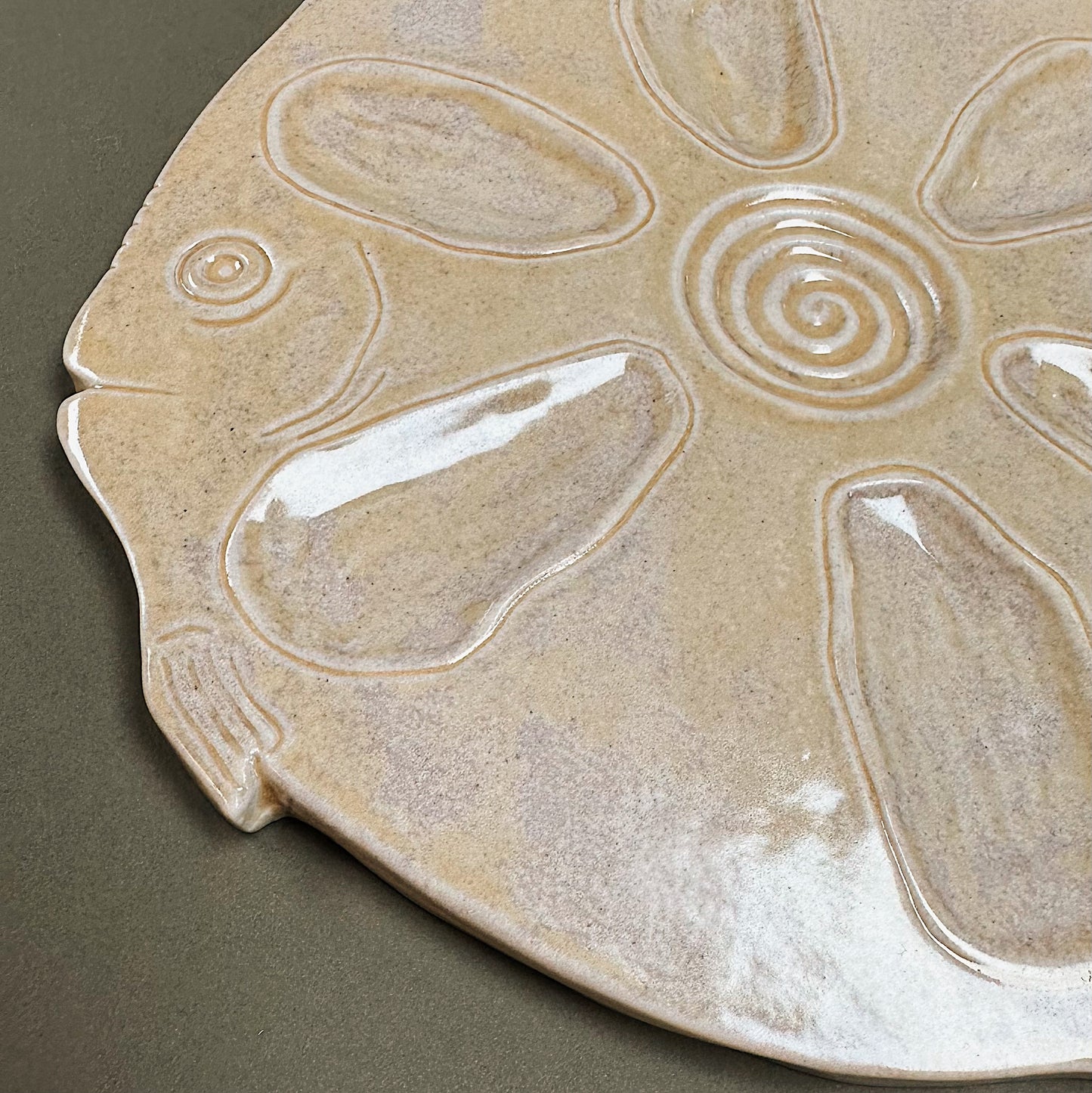 HAND-CARVED OYSTER PLATE