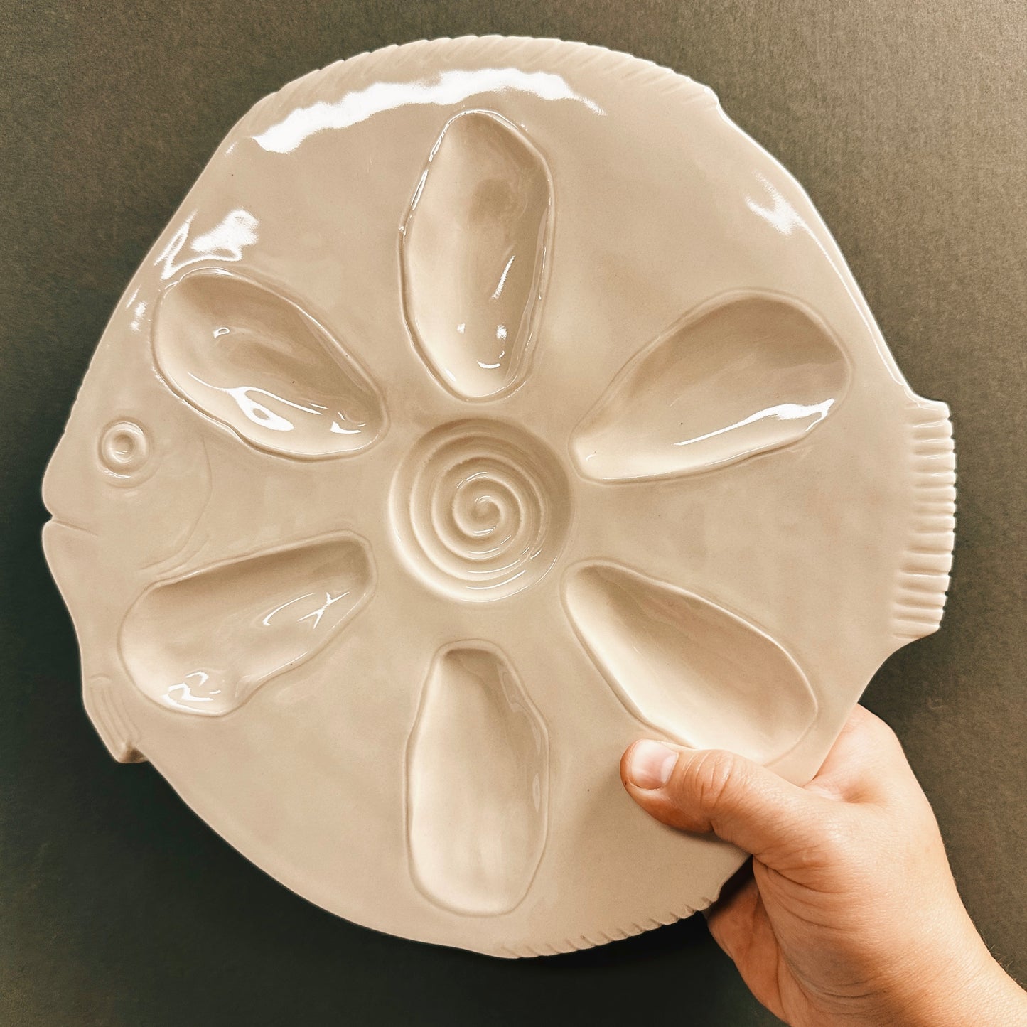 HAND-CARVED OYSTER PLATE
